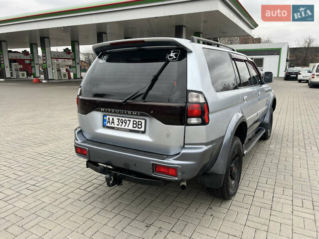 Серый Мицубиси Паджеро Спорт, объемом двигателя 2.5 л и пробегом 250 тыс. км за 8999 $, фото 4 на Automoto.ua