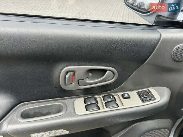 Серый Мицубиси Паджеро Спорт, объемом двигателя 2.5 л и пробегом 250 тыс. км за 8999 $, фото 10 на Automoto.ua