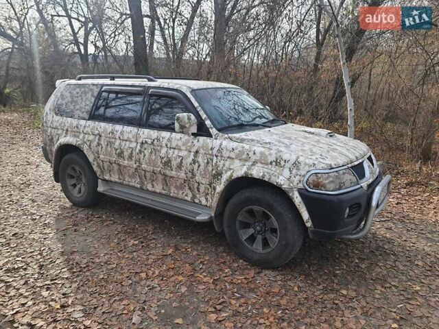 Серый Мицубиси Паджеро Спорт, объемом двигателя 2.48 л и пробегом 272 тыс. км за 9000 $, фото 5 на Automoto.ua