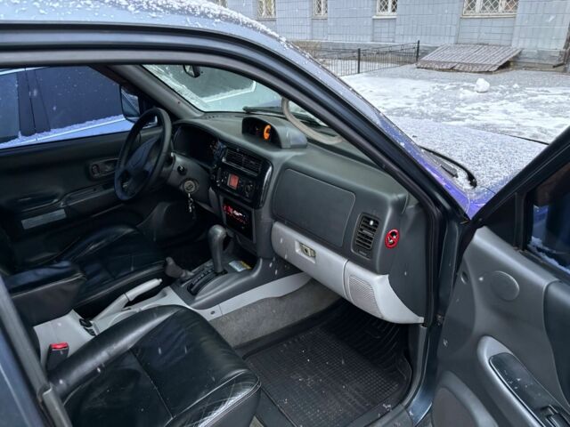 Серый Мицубиси Паджеро Спорт, объемом двигателя 3 л и пробегом 300 тыс. км за 5900 $, фото 6 на Automoto.ua