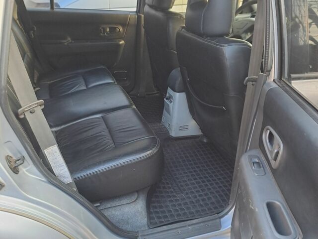 Сірий Міцубісі Паджеро Спорт, об'ємом двигуна 2.5 л та пробігом 215 тис. км за 10200 $, фото 3 на Automoto.ua