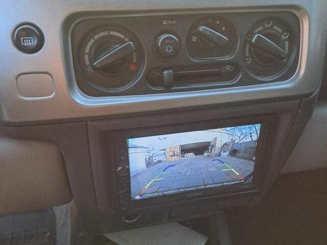 Сірий Міцубісі Паджеро Спорт, об'ємом двигуна 2.5 л та пробігом 215 тис. км за 10200 $, фото 4 на Automoto.ua