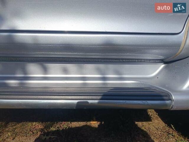 Серый Мицубиси Паджеро Спорт, объемом двигателя 3 л и пробегом 282 тыс. км за 9000 $, фото 3 на Automoto.ua