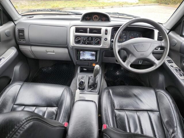 Серый Мицубиси Паджеро Спорт, объемом двигателя 2.5 л и пробегом 68 тыс. км за 6395 $, фото 20 на Automoto.ua