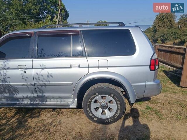 Серый Мицубиси Паджеро Спорт, объемом двигателя 3 л и пробегом 282 тыс. км за 9000 $, фото 2 на Automoto.ua