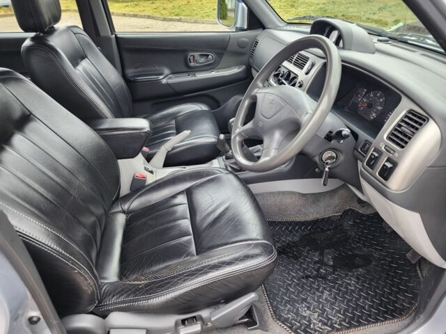 Серый Мицубиси Паджеро Спорт, объемом двигателя 2.5 л и пробегом 68 тыс. км за 6395 $, фото 14 на Automoto.ua