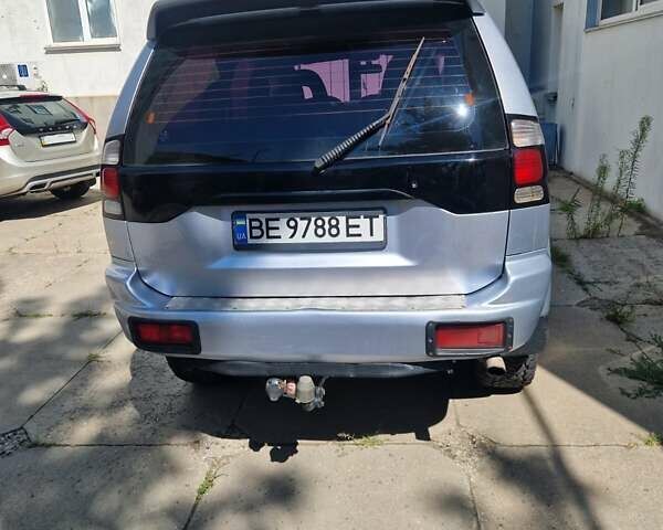 Серый Мицубиси Паджеро Спорт, объемом двигателя 2.48 л и пробегом 327 тыс. км за 8800 $, фото 5 на Automoto.ua