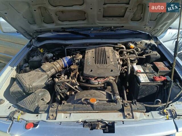 Серый Мицубиси Паджеро Спорт, объемом двигателя 3 л и пробегом 282 тыс. км за 9000 $, фото 19 на Automoto.ua