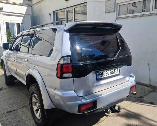 Серый Мицубиси Паджеро Спорт, объемом двигателя 2.48 л и пробегом 327 тыс. км за 8800 $, фото 4 на Automoto.ua