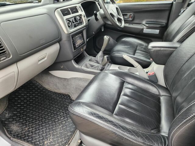 Серый Мицубиси Паджеро Спорт, объемом двигателя 2.5 л и пробегом 68 тыс. км за 6395 $, фото 17 на Automoto.ua