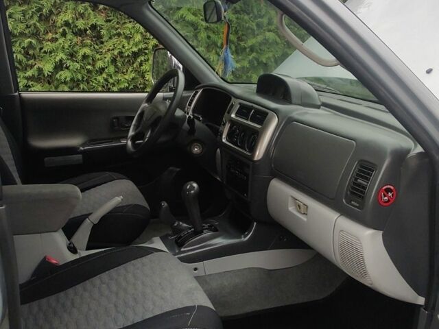 Серый Мицубиси Паджеро Спорт, объемом двигателя 3 л и пробегом 207 тыс. км за 6500 $, фото 16 на Automoto.ua