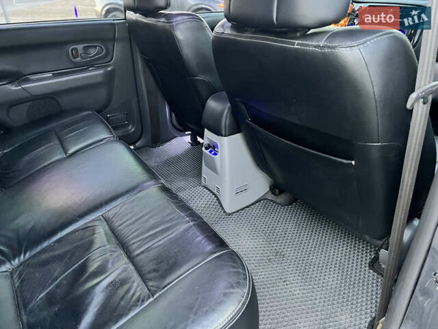 Серый Мицубиси Паджеро Спорт, объемом двигателя 2.97 л и пробегом 322 тыс. км за 8799 $, фото 19 на Automoto.ua