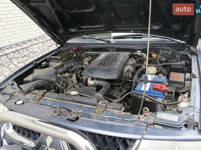 Сірий Міцубісі Паджеро Спорт, об'ємом двигуна 2.97 л та пробігом 220 тис. км за 10500 $, фото 22 на Automoto.ua