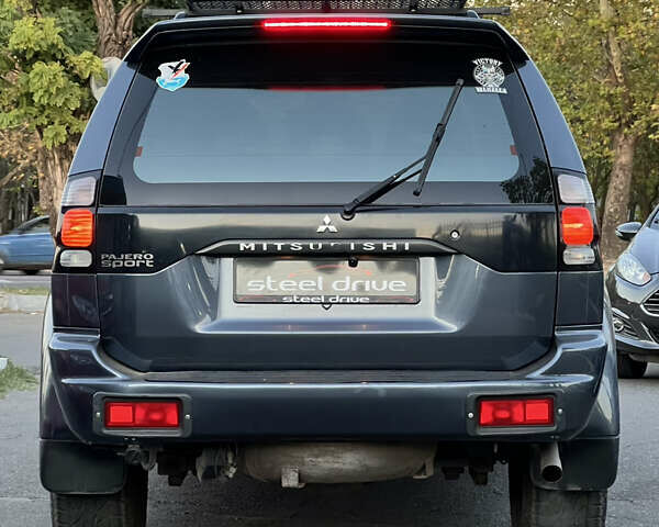 Серый Мицубиси Паджеро Спорт, объемом двигателя 2.97 л и пробегом 322 тыс. км за 8799 $, фото 4 на Automoto.ua