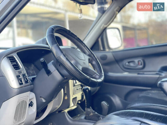 Сірий Міцубісі Паджеро Спорт, об'ємом двигуна 2.48 л та пробігом 225 тис. км за 8800 $, фото 1 на Automoto.ua