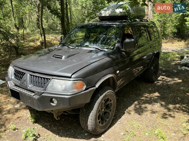 Сірий Міцубісі Паджеро Спорт, об'ємом двигуна 3 л та пробігом 280 тис. км за 6500 $, фото 1 на Automoto.ua