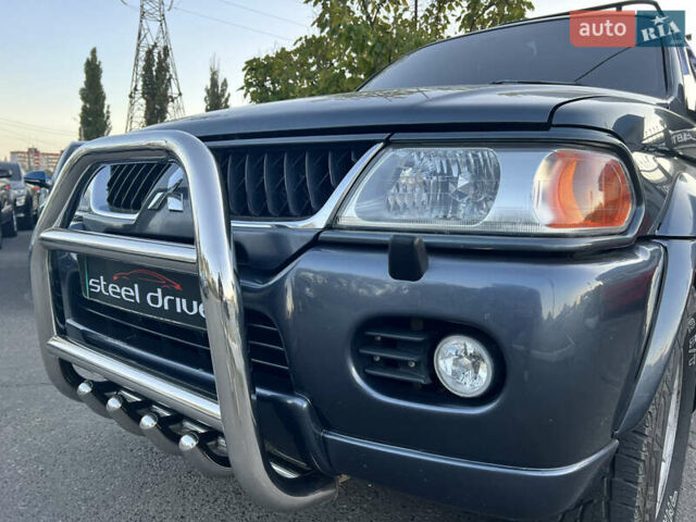Серый Мицубиси Паджеро Спорт, объемом двигателя 2.97 л и пробегом 322 тыс. км за 8799 $, фото 3 на Automoto.ua