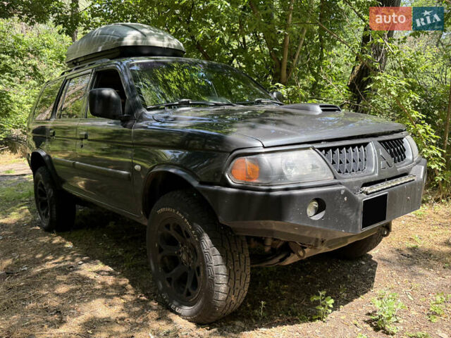 Сірий Міцубісі Паджеро Спорт, об'ємом двигуна 3 л та пробігом 280 тис. км за 6500 $, фото 2 на Automoto.ua