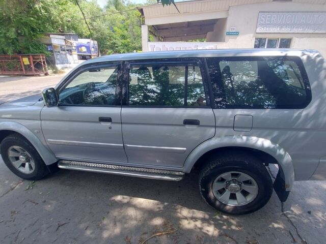 Серый Мицубиси Паджеро Спорт, объемом двигателя 3 л и пробегом 198 тыс. км за 7500 $, фото 3 на Automoto.ua