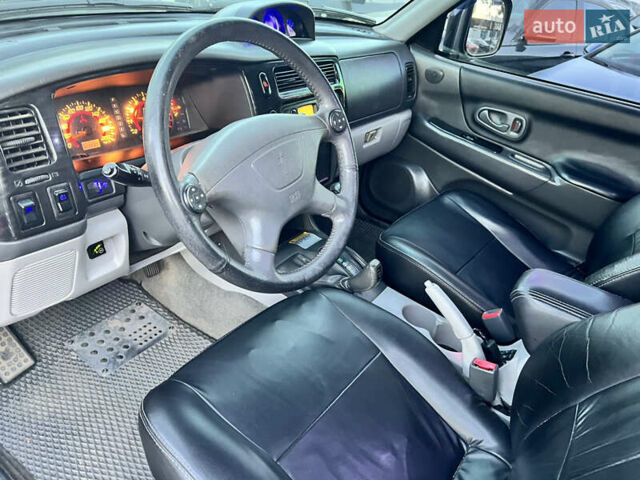 Серый Мицубиси Паджеро Спорт, объемом двигателя 2.97 л и пробегом 322 тыс. км за 8799 $, фото 7 на Automoto.ua