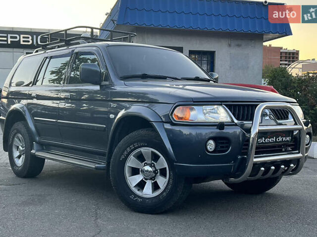 Серый Мицубиси Паджеро Спорт, объемом двигателя 2.97 л и пробегом 322 тыс. км за 8799 $, фото 1 на Automoto.ua