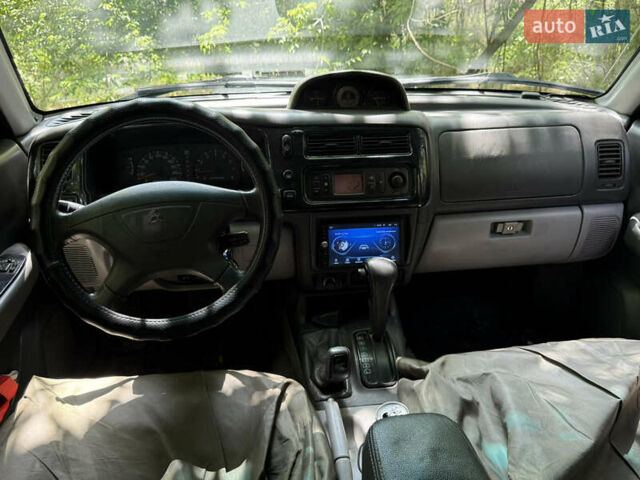 Сірий Міцубісі Паджеро Спорт, об'ємом двигуна 3 л та пробігом 280 тис. км за 6500 $, фото 4 на Automoto.ua