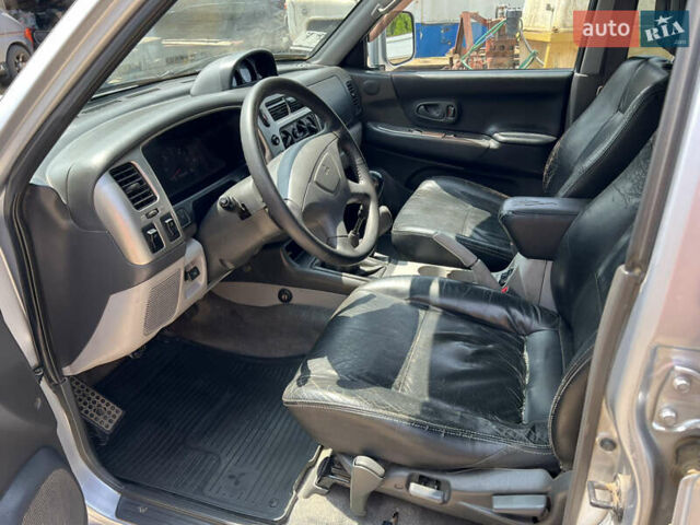 Серый Мицубиси Паджеро Спорт, объемом двигателя 2.48 л и пробегом 395 тыс. км за 9500 $, фото 5 на Automoto.ua