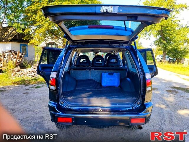 Сірий Міцубісі Паджеро Спорт, об'ємом двигуна 2.5 л та пробігом 186 тис. км за 10700 $, фото 4 на Automoto.ua