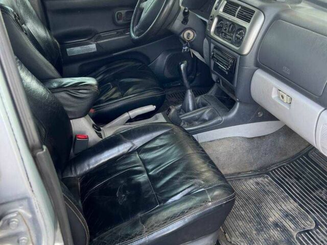 Сірий Міцубісі Паджеро Спорт, об'ємом двигуна 2.5 л та пробігом 300 тис. км за 9000 $, фото 10 на Automoto.ua