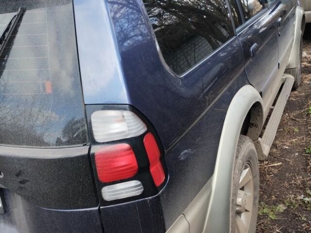 Серый Мицубиси Паджеро Спорт, объемом двигателя 2.5 л и пробегом 360 тыс. км за 8382 $, фото 2 на Automoto.ua