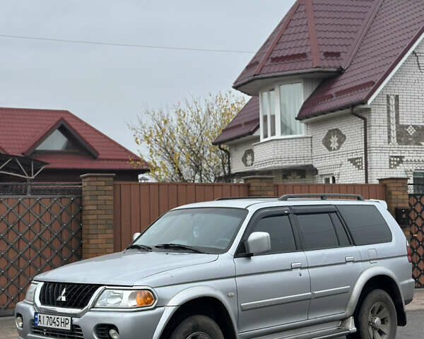 Серый Мицубиси Паджеро Спорт, объемом двигателя 3 л и пробегом 235 тыс. км за 8400 $, фото 4 на Automoto.ua