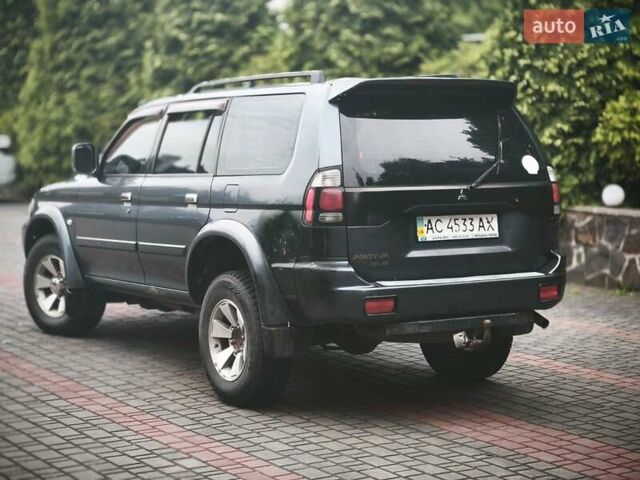 Сірий Міцубісі Паджеро Спорт, об'ємом двигуна 3 л та пробігом 375 тис. км за 8000 $, фото 9 на Automoto.ua