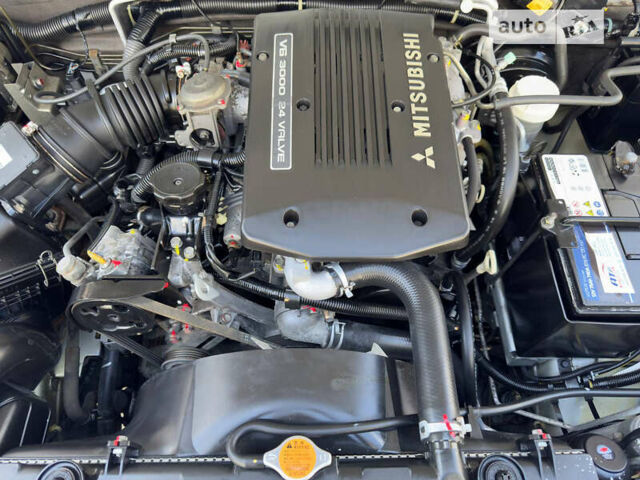 Серый Мицубиси Паджеро Спорт, объемом двигателя 3 л и пробегом 131 тыс. км за 11200 $, фото 98 на Automoto.ua