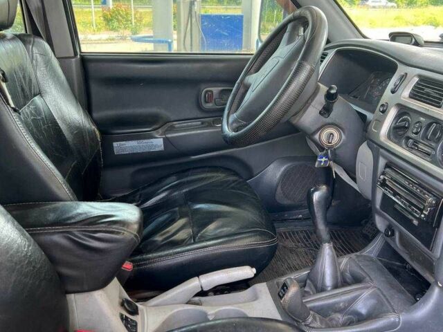 Сірий Міцубісі Паджеро Спорт, об'ємом двигуна 2.5 л та пробігом 300 тис. км за 9000 $, фото 8 на Automoto.ua