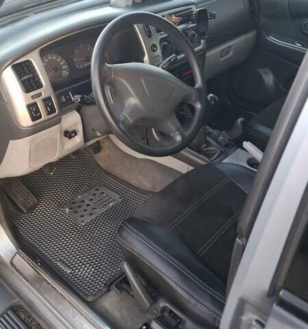 Сірий Міцубісі Паджеро Спорт, об'ємом двигуна 2.5 л та пробігом 223 тис. км за 9300 $, фото 7 на Automoto.ua