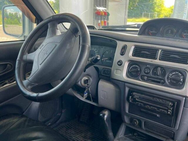 Сірий Міцубісі Паджеро Спорт, об'ємом двигуна 2.5 л та пробігом 300 тис. км за 9000 $, фото 7 на Automoto.ua