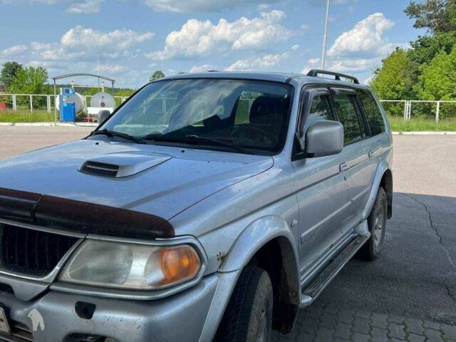 Сірий Міцубісі Паджеро Спорт, об'ємом двигуна 2.5 л та пробігом 300 тис. км за 9000 $, фото 3 на Automoto.ua