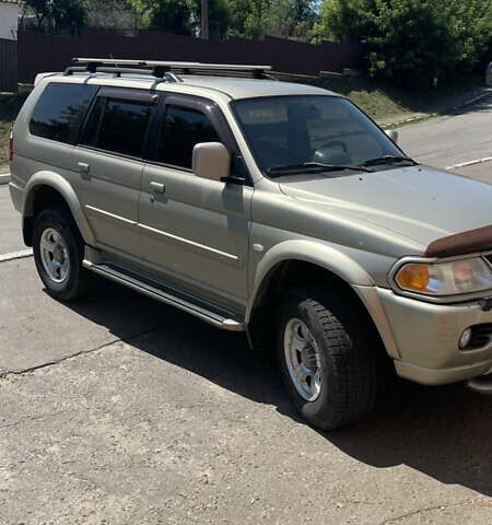 Серый Мицубиси Паджеро Спорт, объемом двигателя 3 л и пробегом 299 тыс. км за 7200 $, фото 5 на Automoto.ua