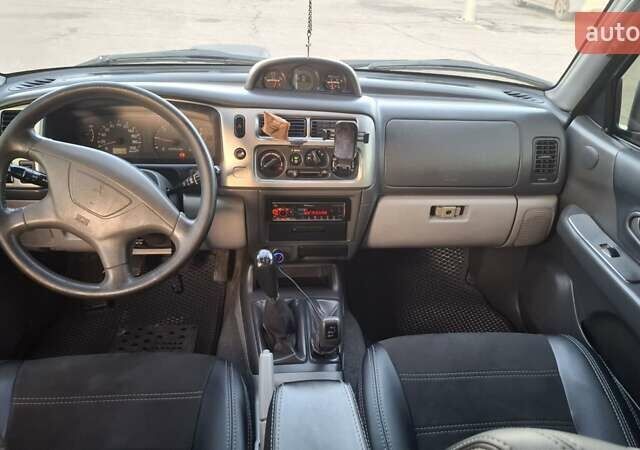 Сірий Міцубісі Паджеро Спорт, об'ємом двигуна 2.5 л та пробігом 223 тис. км за 9300 $, фото 9 на Automoto.ua