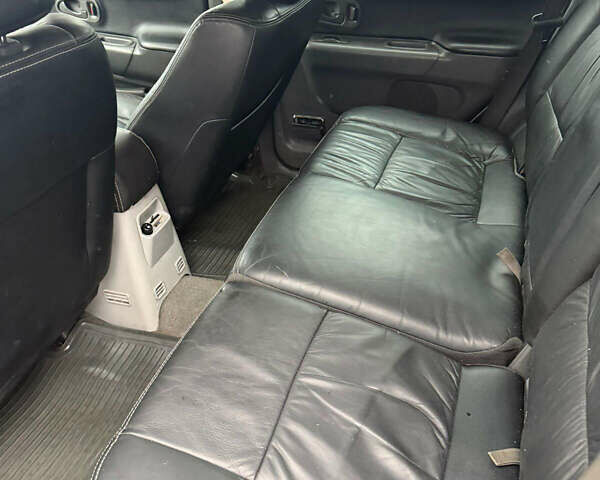 Сірий Міцубісі Паджеро Спорт, об'ємом двигуна 2.5 л та пробігом 300 тис. км за 8800 $, фото 7 на Automoto.ua