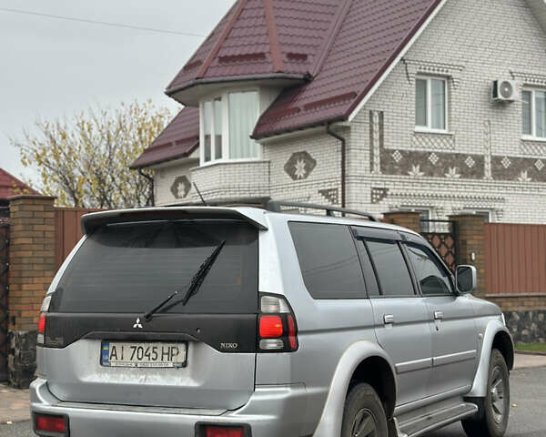 Серый Мицубиси Паджеро Спорт, объемом двигателя 3 л и пробегом 235 тыс. км за 8400 $, фото 7 на Automoto.ua