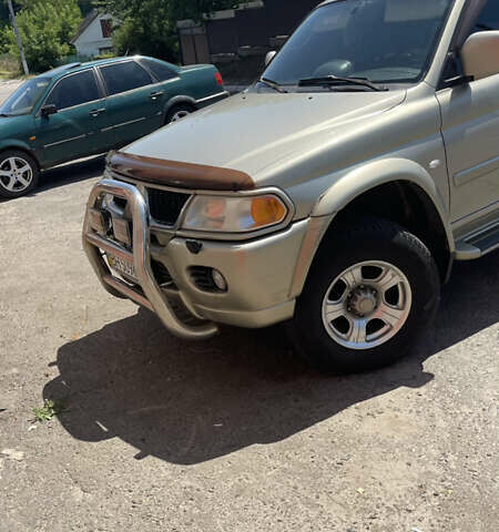 Серый Мицубиси Паджеро Спорт, объемом двигателя 3 л и пробегом 299 тыс. км за 7200 $, фото 2 на Automoto.ua