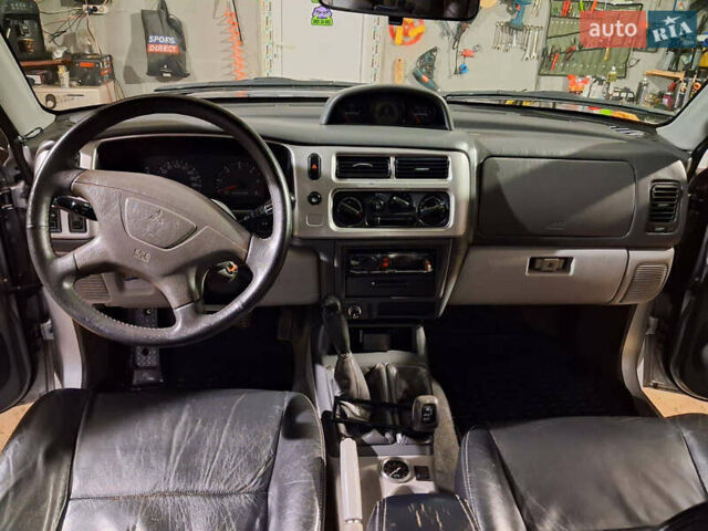 Сірий Міцубісі Паджеро Спорт, об'ємом двигуна 2.5 л та пробігом 260 тис. км за 10500 $, фото 6 на Automoto.ua