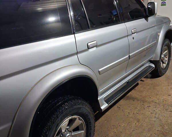 Сірий Міцубісі Паджеро Спорт, об'ємом двигуна 2.5 л та пробігом 260 тис. км за 10500 $, фото 16 на Automoto.ua