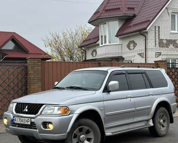 Серый Мицубиси Паджеро Спорт, объемом двигателя 3 л и пробегом 235 тыс. км за 8400 $, фото 1 на Automoto.ua