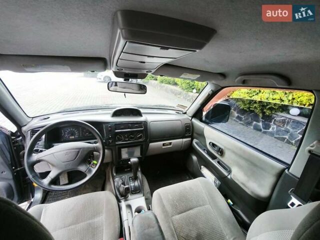 Сірий Міцубісі Паджеро Спорт, об'ємом двигуна 3 л та пробігом 375 тис. км за 8000 $, фото 6 на Automoto.ua