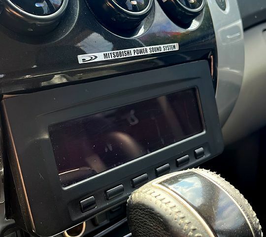 Серый Мицубиси Паджеро Спорт, объемом двигателя 2.5 л и пробегом 150 тыс. км за 16700 $, фото 2 на Automoto.ua