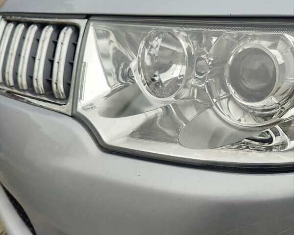 Сірий Міцубісі Паджеро Спорт, об'ємом двигуна 2.48 л та пробігом 85 тис. км за 16000 $, фото 33 на Automoto.ua