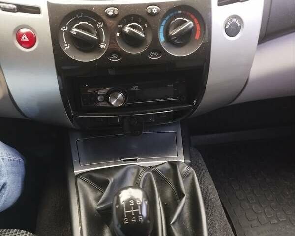 Серый Мицубиси Паджеро Спорт, объемом двигателя 2.48 л и пробегом 255 тыс. км за 14900 $, фото 6 на Automoto.ua