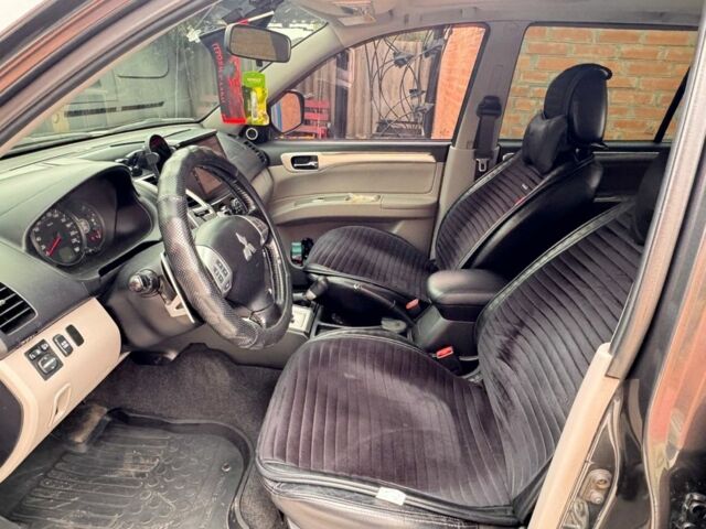 Серый Мицубиси Паджеро Спорт, объемом двигателя 2.5 л и пробегом 190 тыс. км за 15000 $, фото 16 на Automoto.ua